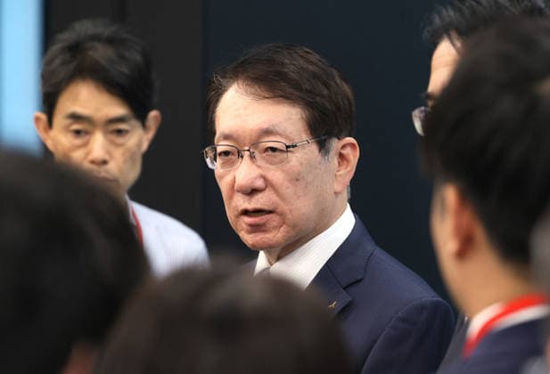 May 29, 2026, Tokyo, Japan - Japan s automaker Mitsubishi Motors (MMC) CEO Takao Kato is surrounded by reporters after he announced the company s mid to long term business strategy at the company s headquarters Tokyo on Friday, May 29, 2026. MMC said all new Pajero cross-country SUV would come back to the market in this year. (photo by Yoshio Tsunoda AFLO)  aflo_332350089