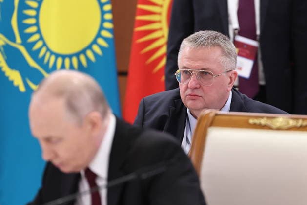 KAZAKHSTAN, ASTANA - MAY 29, 2026: Russia s President Vladimir Putin (front) and Deputy Prime Minister Alexei Overchuk (back) are seen during a narrow-format meeting of the Supreme Eurasian Economic Council at the Palace of Independence. Alexander Kazakov Russian Presidential Press and Information Office TASS  93160969