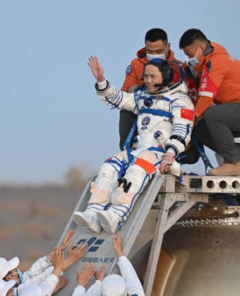 (260529) -- JIUQUAN, May 29, 2026 -- Astronaut Zhang Lu, commander of the three-member Shenzhou-21 crew, is out of the Shenzhou-22 spaceship s return capsule after it touched down at the Dongfeng landing site in north China s Inner Mongolia Autonomous Region, May 29, 2026. The return capsule of the Shenzhou-22 spaceship, carrying the Shenzhou-21 astronauts Zhang Lu, Wu Fei and Zhang Hongzhang, touched down at the Dongfeng landing site on Friday. The three astronauts are all in good health condition, the China Manned Space Agency said, noting that the Shenzhou-21 spaceflight mission is a complete success. ) FOCUS Shenzhou-22 return capsule touches down, astronauts all sound LianxZhen 