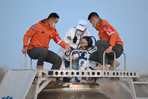 (260529) -- JIUQUAN, May 29, 2026 -- Astronaut Zhang Lu, commander of the three-member Shenzhou-21 crew, is out of the Shenzhou-22 spaceship s return capsule after it touched down at the Dongfeng landing site in north China s Inner Mongolia Autonomous Region, May 29, 2026. The return capsule of the Shenzhou-22 spaceship, carrying the Shenzhou-21 astronauts Zhang Lu, Wu Fei and Zhang Hongzhang, touched down at the Dongfeng landing site on Friday. The three astronauts are all in good health condition, the China Manned Space Agency said, noting that the Shenzhou-21 spaceflight mission is a complete success. ) FOCUS Shenzhou-22 return capsule touches down, astronauts all sound LianxZhen 