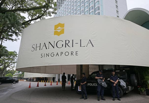 (260529) -- SINGAPORE, May 29, 2026 -- Policemen are on duty at the Shangri-La Hotel, the venue for the Shangri-La Dialogue 2026 in Singapore, May 29, 2026. The Shangri-La Dialogue 2026, Asia s premier defense and security summit, opened on Friday in Singapore amid growing geopolitical tensions. The three-day event, which focuses on major security challenges facing the region, is expected to bring together more than 550 delegates from over 40 countries and regions. (Photo by Xinhua) SINGAPORE-SHANGRI-LA DIALOGUE-KICK-OFF ThenxChihxWey 