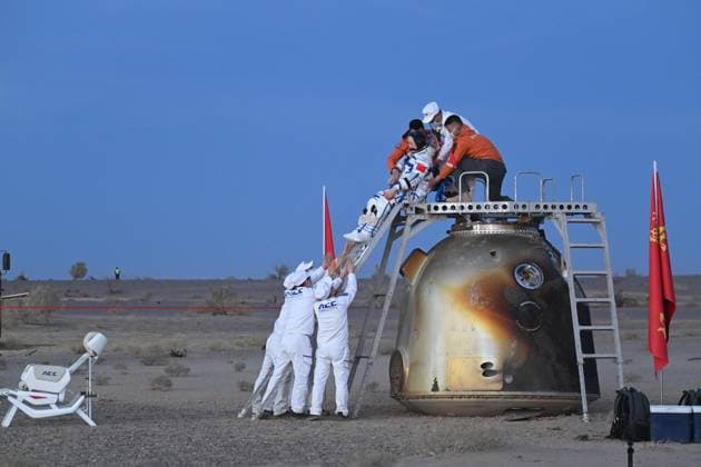 ALXA, CHINA - MAY 29: Astronaut Zhang Hongzhang exits the Shenzhou-22 spacecraft after landing at the Dongfeng Landing Site on May 29, 2026 in Alxa League, Inner Mongolia of China. The Shenzhou-21 crew completed their return mission successfully.  Copyright: xVCGx 111644904206
