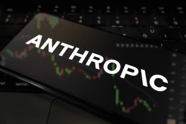 Anthropic The Anthropic logo appears on a smartphone screen, and a stock exchange curve chart displays as the background on a laptop computer screen in Athens, Greece, on May 29, 2026. Anthropic secures $65 billion in funding at a $965 billion post-money valuation in its latest funding round, potentially marking the AI startup s final private fundraising before entering public markets. Athens Greece  Copyright: xNikolasxKokovlisx originalFilename: kokovlis-notitle260529_npsCu.jpg