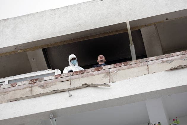 (260529) -- GALATI, May 29, 2026 -- Staff workers check the residential apartment building damaged by a Russian drone in Galati, Romania, May 29, 2026. At least two people were injured after a drone struck a residential apartment building in Galati, Romania, near the border with Ukraine, local media reported Friday. (Photo by Xinhua) ROMANIA-GALATI-DRONE CristianxCristel 