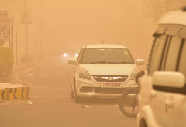 Vehicles move on a road amid a dust storm Bikaner, May 30 (ANI): Vehicles move on a road amid a dust storm, in Bikaner on Saturday. Bikaner Rajasthan India Copyright: xANIx ANI_20260530158