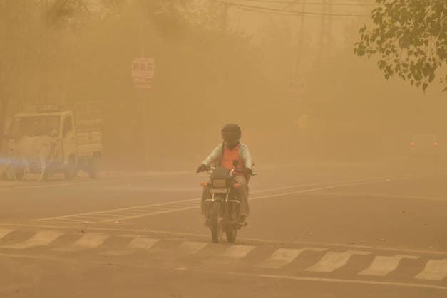 A biker moves on a road amid a dust storm Bikaner, May 30 (ANI): A biker moves on a road amid a dust storm, in Bikaner on Saturday. Bikaner Rajasthan India Copyright: xANIx ANI_20260530161