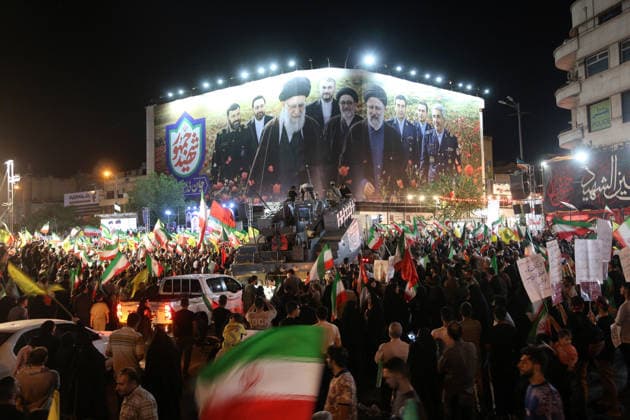 Thousands gather in Tehran to protest US and Israeli attacks TEHRAN, IRAN - MAY 30: Thousands of people gather at Revolution Square to protest against the attacks launched by the US and Israel on Iran, in Tehran, Iran, on May 30, 2026. Demonstrators carried Iranian flags and posters of the late Iranian Supreme Leader Ali Khamenei, who lost his life in the attacks, while chanting slogans against the US and Israel. Fatemeh Bahrami Anadolu Tehran Iran. Editorial use only. Please get in touch for any other usage.  Copyright: x2026xAnadoluxFatemehxBahramix