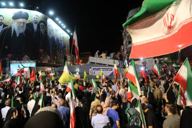 Thousands gather in Tehran to protest US and Israeli attacks TEHRAN, IRAN - MAY 30: Thousands of people gather at Revolution Square to protest against the attacks launched by the US and Israel on Iran, in Tehran, Iran, on May 30, 2026. Demonstrators carried Iranian flags and posters of the late Iranian Supreme Leader Ali Khamenei, who lost his life in the attacks, while chanting slogans against the US and Israel. Fatemeh Bahrami Anadolu Tehran Iran. Editorial use only. Please get in touch for any other usage.  Copyright: x2026xAnadoluxFatemehxBahramix