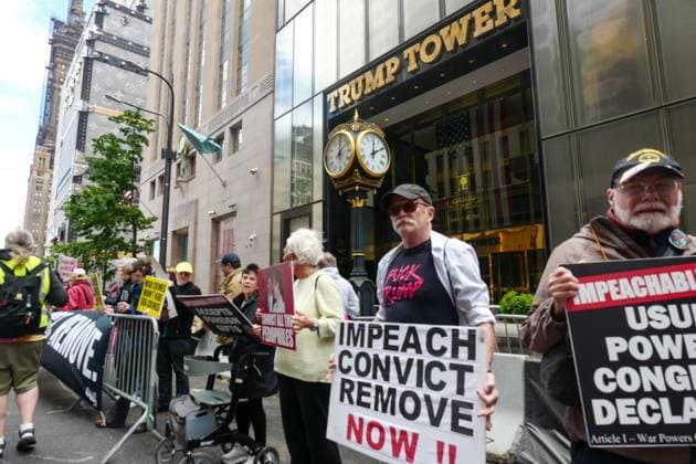 New York, NY- May 30: Activist Group Rise and Resist Protest in Front of Trump Tower Fifth Ave to Impeach, Convict, and Remove President of USA Donald J. Trump. Demonstrators chant People Rising Up, Trump Coming Down on May 30, 2026 Copyright: xAdMediax MediaPunchx