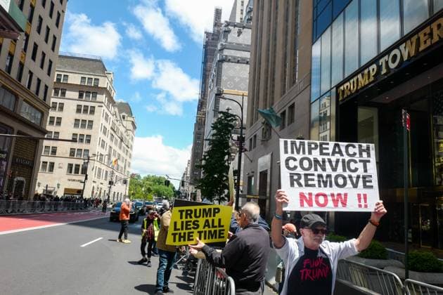 New York, NY- May 30: Activist Group Rise and Resist Protest in Front of Trump Tower Fifth Ave to Impeach, Convict, and Remove President of USA Donald J. Trump. Demonstrators chant People Rising Up, Trump Coming Down on May 30, 2026 Copyright: xAdMediax MediaPunchx