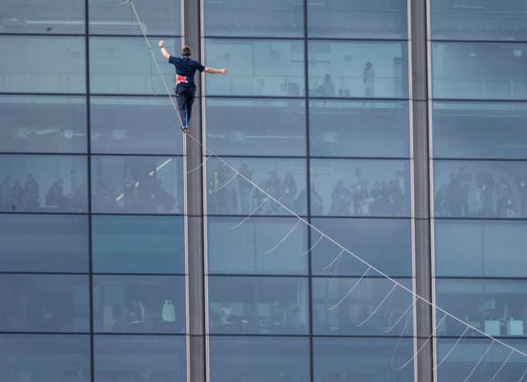 Slackliner walks between two tallest building in Warsaw Photo: Dawid Wolski East News Estonian slackliner Jaan Roose attempts to walk the highline between two tallest buildings in the Polish capital during the Red Bull Line of Time over Warsaw event on May 31, 2026 in Warsaw, Poland. The 500-meter-long slackline is stretched between the communist era, Soviet designed Palace of Culture and Science and recently constructed, designed by Foster and Partners Varso Tower at 180 meters above street level. EN_01678444_0045 