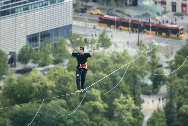Slackliner walks between two tallest building in Warsaw Photo: Adam Burakowski East News Estonian slackliner Jaan Roose attempts to walk the highline between two tallest buildings in the Polish capital during the Red Bull Line of Time over Warsaw event on May 31, 2026 in Warsaw, Poland. The 500-meter-long slackline is stretched between the communist era, Soviet designed Palace of Culture and Science and recently constructed, designed by Foster and Partners Varso Tower at 180 meters above street level. EN_01678444_0054 