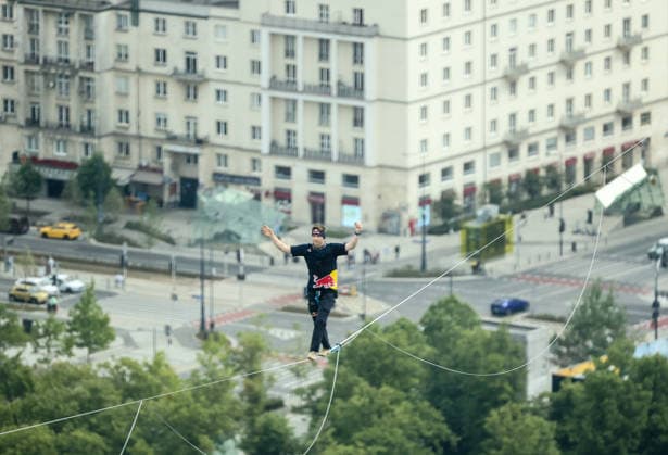 Slackliner walks between two tallest building in Warsaw Photo: Adam Burakowski East News Estonian slackliner Jaan Roose attempts to walk the highline between two tallest buildings in the Polish capital during the Red Bull Line of Time over Warsaw event on May 31, 2026 in Warsaw, Poland. The 500-meter-long slackline is stretched between the communist era, Soviet designed Palace of Culture and Science and recently constructed, designed by Foster and Partners Varso Tower at 180 meters above street level. EN_01678444_0056 