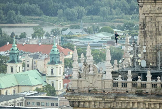 Slackliner walks between two tallest building in Warsaw Photo: Adam Burakowski East News Estonian slackliner Jaan Roose attempts to walk the highline between two tallest buildings in the Polish capital during the Red Bull Line of Time over Warsaw event on May 31, 2026 in Warsaw, Poland. The 500-meter-long slackline is stretched between the communist era, Soviet designed Palace of Culture and Science and recently constructed, designed by Foster and Partners Varso Tower at 180 meters above street level. EN_01678444_0070 