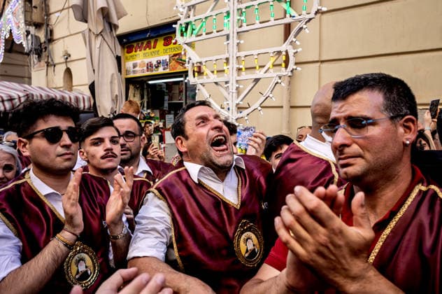 Solemn procession in honour of St Rita of Cascia to Palermo PALERMO, ITALY - MAY 31: Member of the Confraternity ask of Saint Rita of Cascia for grace during the solemn procession with the statue of Saint Rita of Cascia, the venerated Saint of impossible miracles in the Capo district on May 31, 2026 in Palermo, Italy. The cult of the Saint spread in Palermo in 1922, the year in which the first festival in her honour was organised, and she is venerated within the 14th-century church and convent of Saint Augustine, in the Capo district. Palermo Sicily Italy Copyright: xStefanoxMontesix