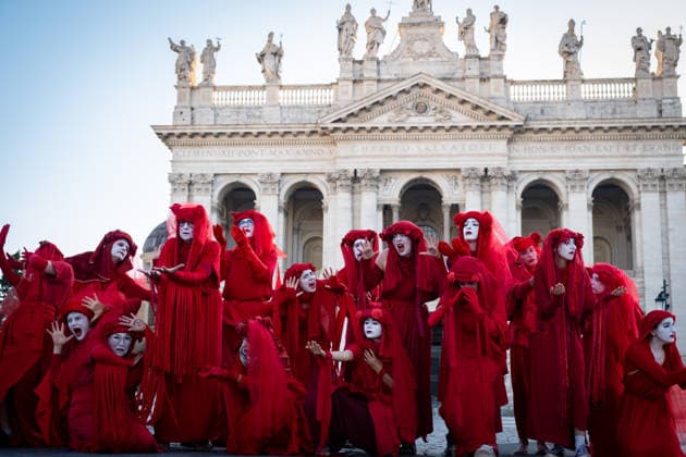 May 31, 2026, Rome, Rm, Italy: A few days before the 80th anniversary of the Italian Republic on June 2nd, the action of Red Rebels Brigade, in front of San Giovanni Basilica, expresses the deep sorrow for the victims of war and the climate crisis, showing their anger toward the government that finances both with its policies. The Red Rebels are a symbol of hope for a world where violence does not reign, but rather peace and harmony with the earth. Rome Italy  - ZUMAg256 20260531_znp_g256_007 Copyright: xMarcoxDixGianvitox