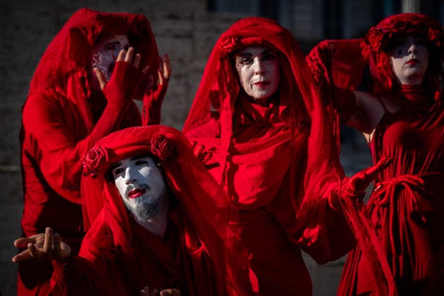 May 31, 2026, Rome, Rm, Italy: A few days before the 80th anniversary of the Italian Republic on June 2nd, the action of Red Rebels Brigade, in front of San Giovanni Basilica, expresses the deep sorrow for the victims of war and the climate crisis, showing their anger toward the government that finances both with its policies. The Red Rebels are a symbol of hope for a world where violence does not reign, but rather peace and harmony with the earth. Rome Italy  - ZUMAg256 20260531_znp_g256_030 Copyright: xMarcoxDixGianvitox