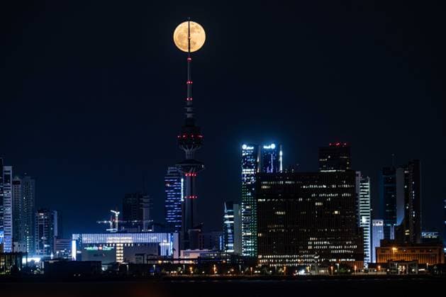 (260601) -- KUWAIT CITY, June 1, 2026 -- The full moon, known as the Blue Moon, is seen over Kuwait City, Kuwait, on May 31, 2026. (Photo by Xinhua) KUWAIT-KUWAIT CITY-FULL MOON Asad 