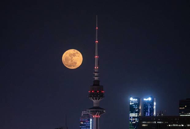 (260601) -- KUWAIT CITY, June 1, 2026 -- The full moon, known as the Blue Moon, is seen over Kuwait City, Kuwait, on May 31, 2026. (Photo by Xinhua) KUWAIT-KUWAIT CITY-FULL MOON Asad 