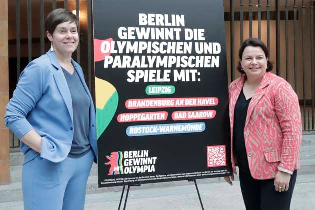 01.06.2026, Einreichung des Bewerbungskonzept beim DOSB ãBerlin+Ò für Olympische Spiele 2036,2040 oder 2044 beim DOSB, Deutscher Olympische Sportbund, Pressekonferenz in Berlin, Haus des Sport im Olympiapark, Stefanie Drese, Ministerin für Soziales, Gesundheit und Sport des Landes Mecklenburg-Vorpommern, Eva-Maria Kröger, Oberbürgermeisterin der Stadt Rostock, Plakat Berlin gewinnt Olympia, Plakat Berlin gewinnt die Olympischen und paralympischen Spiele mit. Berlin Deutschland, Germany *** 01 06 2026, Submission of the bid concept to the DOSB ÒBerlin Ò for the 2036, 2040 or 2044 Olympic Games to the DOSB, German Olympic Sports Confederation, Press conference in Berlin, Haus des Sport im Olympiapark, Stefanie Drese, Minister for Social A