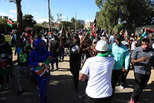 Protesters demonstrate the Ebola treatment center established or Americans in Kenya NANYUKI, KENYA - JUNE 1: Protesters march toward the entrance of Laikipia Air Base and chant slogans during a demonstration against plans to establish an Ebola quarantine facility for U.S. citizens diagnosed with Ebola in Nanyuki, Kenya, on June 1, 2026. Lucas Mukasa Anadolu Nanyuki Kenya. Editorial use only. Please get in touch for any other usage.  Copyright: x2026xAnadoluxLucasxMukasax