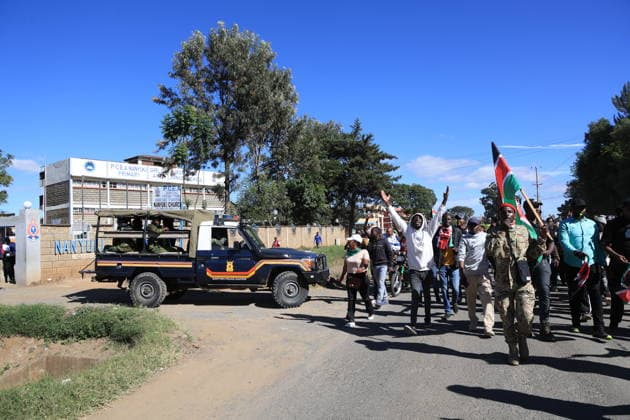 Protesters demonstrate the Ebola treatment center established or Americans in Kenya NANYUKI, KENYA - JUNE 1: Protesters march toward the entrance of Laikipia Air Base and chant slogans during a demonstration against plans to establish an Ebola quarantine facility for U.S. citizens diagnosed with Ebola in Nanyuki, Kenya, on June 1, 2026. Lucas Mukasa Anadolu Nanyuki Kenya. Editorial use only. Please get in touch for any other usage.  Copyright: x2026xAnadoluxLucasxMukasax