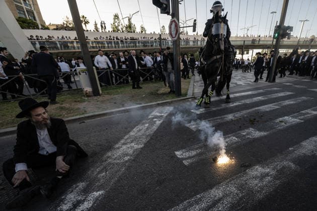 Ultra-Orthodox Jews protest mandatory military service in Jerusalem JERUSALEM - JUNE 1: Israeli police use stun grenades and mounted units to disperse ultra-Orthodox Jewish (Haredi) demonstrators protesting the detention of draft resisters and mandatory military service in West Jerusalem on June 1, 2026. Gathering at the Hamitarim Bridge, a major junction in the city, protesters condemned the arrest of nine Haredi men in Beit Shemesh a day earlier and blocked traffic, causing major disruptions before police moved to clear the roadway. Mostafa Alkharouf Anadolu Jerusalem Israel. Editorial use only. Please get in touch for any other usage.  Copyright: x2026xAnadoluxMostafaxAlkharoufx