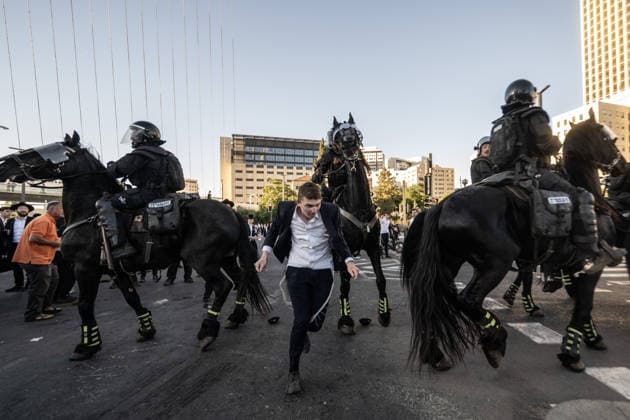 Ultra-Orthodox Jews protest mandatory military service in Jerusalem JERUSALEM - JUNE 1: Israeli police use stun grenades and mounted units to disperse ultra-Orthodox Jewish (Haredi) demonstrators protesting the detention of draft resisters and mandatory military service in West Jerusalem on June 1, 2026. Gathering at the Hamitarim Bridge, a major junction in the city, protesters condemned the arrest of nine Haredi men in Beit Shemesh a day earlier and blocked traffic, causing major disruptions before police moved to clear the roadway. Mostafa Alkharouf Anadolu Jerusalem Israel. Editorial use only. Please get in touch for any other usage.  Copyright: x2026xAnadoluxMostafaxAlkharoufx
