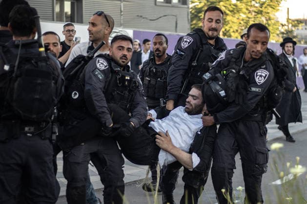 Ultra-Orthodox Jews protest mandatory military service in Jerusalem JERUSALEM - JUNE 1: Israeli police use stun grenades and mounted units to disperse ultra-Orthodox Jewish (Haredi) demonstrators protesting the detention of draft resisters and mandatory military service in West Jerusalem on June 1, 2026. Gathering at the Hamitarim Bridge, a major junction in the city, protesters condemned the arrest of nine Haredi men in Beit Shemesh a day earlier and blocked traffic, causing major disruptions before police moved to clear the roadway. Mostafa Alkharouf Anadolu Jerusalem Israel. Editorial use only. Please get in touch for any other usage.  Copyright: x2026xAnadoluxMostafaxAlkharoufx