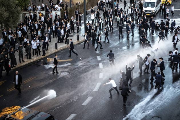 Ultra-Orthodox Jews protest mandatory military service in Jerusalem JERUSALEM - JUNE 1: Israeli police use stun grenades and mounted units to disperse ultra-Orthodox Jewish (Haredi) demonstrators protesting the detention of draft resisters and mandatory military service in West Jerusalem on June 1, 2026. Gathering at the Hamitarim Bridge, a major junction in the city, protesters condemned the arrest of nine Haredi men in Beit Shemesh a day earlier and blocked traffic, causing major disruptions before police moved to clear the roadway. Mostafa Alkharouf Anadolu Jerusalem Israel. Editorial use only. Please get in touch for any other usage.  Copyright: x2026xAnadoluxMostafaxAlkharoufx