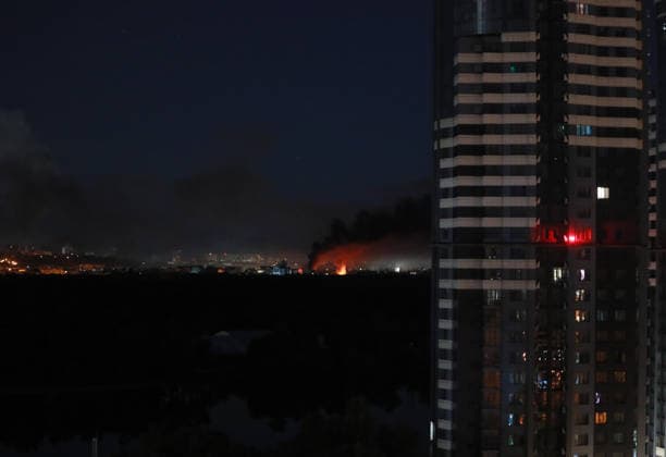 (260602) -- KIEV, June 2, 2026 -- Smokes and fire are seen in Kiev, Ukraine, June 2, 2026. Multiple explosions were heard in the Ukrainian capital of Kiev on Tuesday, prompting authorities to urge residents to seek shelter, according to local media reports. ) (SpotNews) UKRAINE-KIEV-EXPLOSIONS LixDongxu 