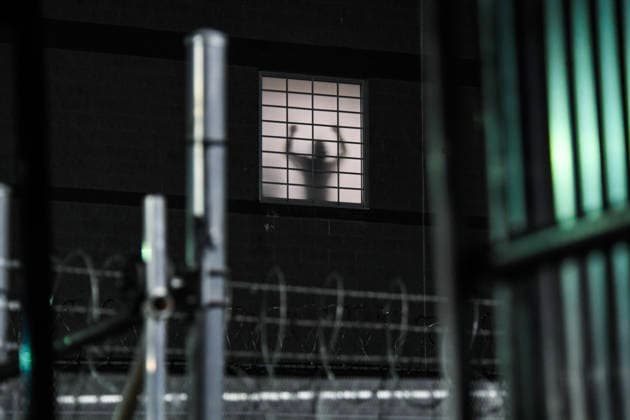 June 1, 2026, Newark, New Jersey, United States: The silhouette of a detainee being held at Delaney Hall seen through barbed wire during a protest. Protests continue to be held daily as detainees at Delaney Hall maintain a hunger and labor strike against current conditions at the facility. Newark United States  - ZUMAs197 20260601_aaa_s197_254 Copyright: xMatthewxHatcherx