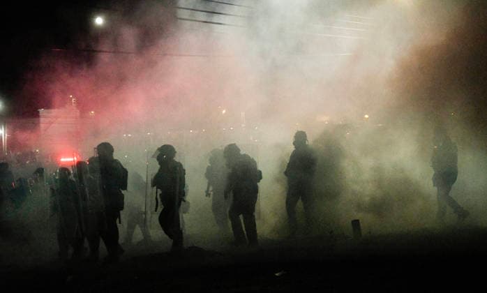 June 1, 2026, Newark, New Jersey, United States: New Jersey state police advance on protesters through clouds of teargas during clashes outside Delaney Hall during a protest. Protests continue to be held daily as detainees at Delaney Hall maintain a hunger and labor strike against current conditions at the facility. Newark United States - ZUMAs197 20260601_aaa_s197_242 Copyright: xMatthewxHatcherx