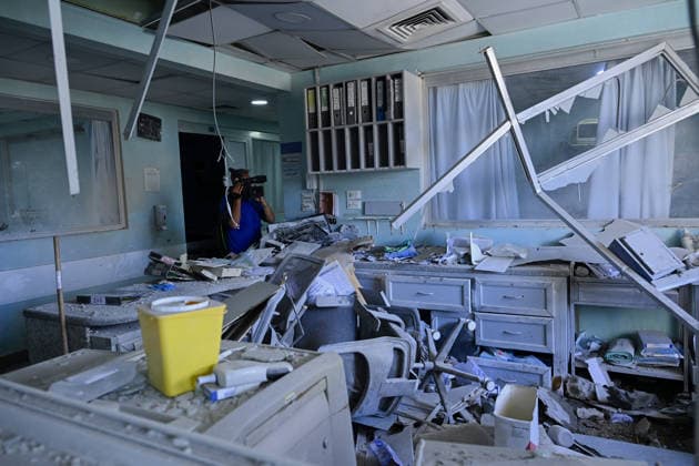 Damage reported near hospital following strike in southern Lebanon TYRE, LEBANON - JUNE 02: Buildings and a parking area opposite Jabal Amel Hospital, the largest hospital in the city of Tyre, sustain heavy damage following a strike in the Maarakah area of southern Lebanon, on June 02, 2026. The hospital building, nearby structures, and vehicles are also damaged. Houssam Shbaro Anadolu Tyre Lebanon. Editorial use only. Please get in touch for any other usage.  Copyright: x2026xAnadoluxHoussamxShbarox