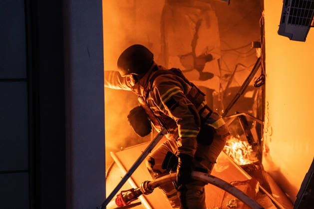 June 2, 2026, Kyiv, Ukraine: Ukrainian firefighter works to extinguish a burning commercial building damaged during a Russian missile and drone attack in Kyiv. Kyiv Ukraine - ZUMAs197 20260602_aaa_s197_037 Copyright: xPatrykxJaraczx