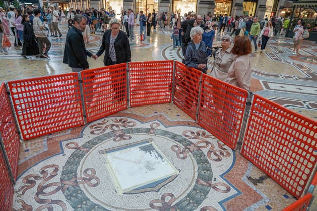 IPA85258296 - MILAN, 2 06 2026 - Galleria Vittorio Emanuele, the famous Taurus mosaic in the Galleria covered after restoration with coins thrown by tourists.  Copyright: xEmanuelexRobertoxDexCarlix xx 85258296