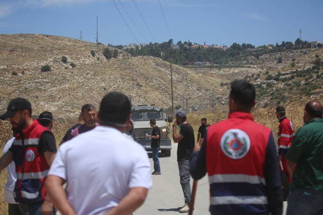 Palestinians gather near fire in agricultural land west of Hebron Palestinians and members of the Palestinian Civil Defense gather near the site of a fire on agricultural land around the village of Idhna, west of the West Bank city of Hebron, on June 2, 2026. Palestinian residents said Israeli settlers set fire to land in the area, while the Israeli army prevented residents from reaching it and intervened at the site. Photo by Mamoun Wazwaz apaimages Hebron West Bank Palestinian Territory 020626_Hebron_MW_00(16) Copyright: xapaimagesxMamounxWazwazx xapaimagesx
