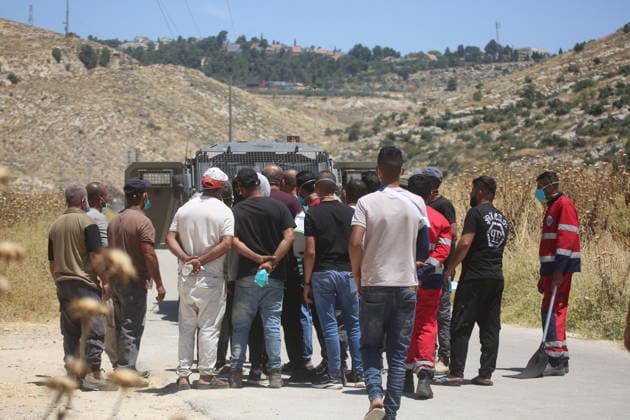 Palestinians gather near fire in agricultural land west of Hebron Palestinians and members of the Palestinian Civil Defense gather near the site of a fire on agricultural land around the village of Idhna, west of the West Bank city of Hebron, on June 2, 2026. Palestinian residents said Israeli settlers set fire to land in the area, while the Israeli army prevented residents from reaching it and intervened at the site. Photo by Mamoun Wazwaz apaimages Hebron West Bank Palestinian Territory 020626_Hebron_MW_00(19) Copyright: xapaimagesxMamounxWazwazx xapaimagesx