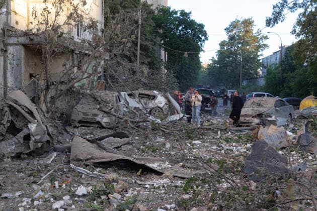 Aftermath of Russian overnight attack in Kyiv™s Podilskyi district People stand among the rubble outside a nine-storey apartment block in the Podilskyi district, damaged by a massive Russian missile and drone attack, Kyiv, Ukraine, on 2 June 2026. The overnight strike killed six people and injured 79, including three children, in the Ukrainian capital. In the Podilskyi district, residential buildings, a garage cooperative, a communal enterprise, and a four-storey educational institution sustained damage as a result of the attack., Credit:Kirill Chubotin Ukrinform Avalon Ukraine, Kyiv  Copyright: xKirillxChubotinx xUkrinformx xAvalonx 1107309884