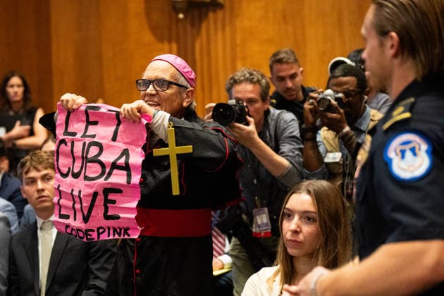 Secretary of State Marco Rubio UNITED STATES - JUNE 2: CodePink protester dressed as a pop holds a let Cuba live sign as Secretary of State Marco Rubio prepares to testify to the Senate Foreign Relations Committee hearing on the budget request for the State Department in the Dirksen Senate Office Building on Tuesday, June 2, 2026. (Bill Clark CQ Roll Call) Washington DC United States EDITORIAL USE ONLY Copyright: x 2026xCQxRollxCallx BillxClarkx rollcallpix171279