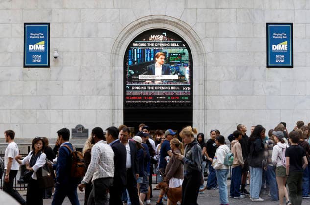 Dime Commercial Bank sings are displayed at the entrance to the New York Stock Exchange on Wall Street on Tuesday, June 2, 2026 in New York City. According to Tuesday s Job Openings and Labor Turnover Survey, Job openings surged in April to reach their highest level since May 2024.  NYP20260602101 JOHNxANGELILLO