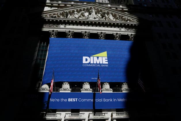 Dime Commercial Bank banners hang at the entrance to the New York Stock Exchange on Wall Street on Tuesday, June 2, 2026 in New York City. According to Tuesday s Job Openings and Labor Turnover Survey, Job openings surged in April to reach their highest level since May 2024.  NYP20260602104 JOHNxANGELILLO
