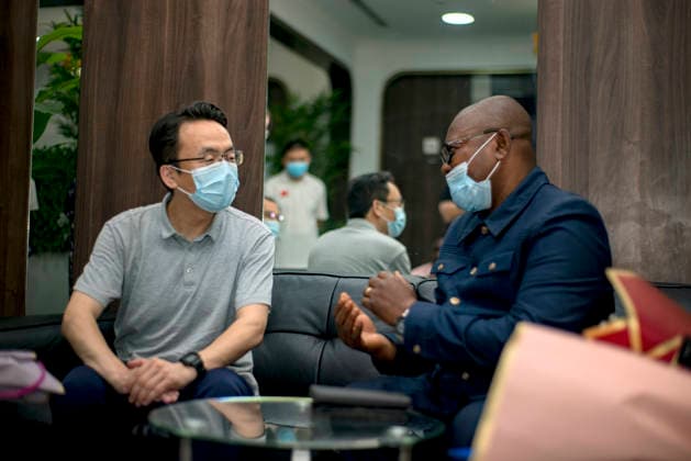 (260602) -- KINSHASA, June 2, 2026 () -- Lu Ming (L), head of the Chinese expert team, talks with Luku Maleyo Marius, a representative of the Ministry of Health of Democratic Republic of the Congo (DRC), in Kinshasa, capital of the DRC, June 2, 2026. A Chinese anti-epidemic medical expert team arrived in Kinshasa on Tuesday for a three-month mission to support the Central African country s response to the Ebola outbreak. () DR CONGO-KINSHASA-CHINESE MEDICAL EXPERT TEAM Xinhua 