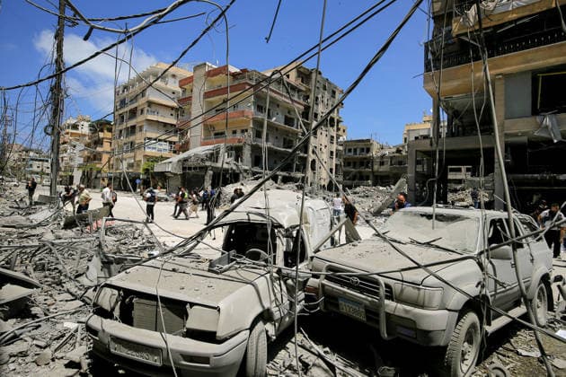 June 2, 2026, Tyre, Tyre, Lebanon: Lebanese women look from a window of partially destroyed Jabal Amel Hospital at demolished buildings that were targeted by Israeli air strikes in the southern Lebanese port city of Tyre. Clashes have continued in southern Lebanon despite Israel and Hezbollah accepting a US plan for a partial ceasefire. President Donald Trump said he had spoken to both sides and they agreed that all shooting will stop , after Iran warned Israeli military actions in Lebanon were a threat to the US-Iran ceasefire. Tyre Lebanon - ZUMAn313 20260602_zip_n313_017 Copyright: xMarwanxNaamanix