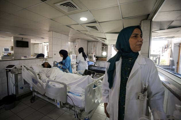 June 2, 2026, Tyre, Tyre, Lebanon: Nurses tend a wounded Lebanese at Jabal Amel Hospital that was partially destroyed in Israeli air strikes in the southern Lebanese port city of Tyre. Clashes have continued in southern Lebanon despite Israel and Hezbollah accepting a US plan for a partial ceasefire. President Donald Trump said he had spoken to both sides and they agreed that all shooting will stop , after Iran warned Israeli military actions in Lebanon were a threat to the US-Iran ceasefire. Tyre Lebanon - ZUMAn313 20260602_zip_n313_011 Copyright: xMarwanxNaamanix