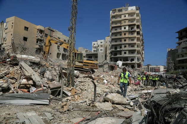 June 2, 2026, Beirut, Beirut, Lebanon: 02 June 2026, Lebanon, Tyre: Members of Islamic Association demolished buildings that were targeted by Israeli air strikes in the vicinity of Jabal Amel Hospital in the southern Lebanese port city of Tyre. Clashes have continued in southern Lebanon despite Israel and Hezbollah accepting a US plan for a partial ceasefire. President Donald Trump said on Monday that he had spoken to both sides and they agreed that all shooting will stop , after Iran warned Israeli military actions in Lebanon were a threat to the US-Iran ceasefire. Photo: dpa Beirut Lebanon  - ZUMAn313 20260602_zip_n313_007 Copyright: xMarwanxNaamanix