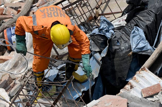 NEW DELHI, INDIA - JUNE 2: NDRF team conducts a search and rescue operation as a building collapsed after the cylinder blast in Mukundpur, Burari, on June 2, 2026 in New Delhi, India. Neighbours and officials alleged that a large number of cylinders were being stored illegally inside the house where the blast occurred. (Photo by Ishant Chauhan Hindustan Times ) House Collapses After Cylinder Blast In Delhi™s Mukundpur, People Feared Trapped Under Debris