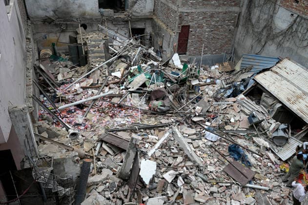 NEW DELHI, INDIA - JUNE 2: NDRF team conducts a search and rescue operation as a building collapsed after the cylinder blast in Mukundpur, Burari, on June 2, 2026 in New Delhi, India. Neighbours and officials alleged that a large number of cylinders were being stored illegally inside the house where the blast occurred. (Photo by Ishant Chauhan Hindustan Times ) House Collapses After Cylinder Blast In Delhi™s Mukundpur, People Feared Trapped Under Debris