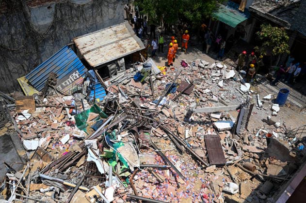 NEW DELHI, INDIA - JUNE 2: NDRF team conducts a search and rescue operation as a building collapsed after the cylinder blast in Mukundpur, Burari, on June 2, 2026 in New Delhi, India. Neighbours and officials alleged that a large number of cylinders were being stored illegally inside the house where the blast occurred. (Photo by Ishant Chauhan Hindustan Times ) House Collapses After Cylinder Blast In Delhi™s Mukundpur, People Feared Trapped Under Debris