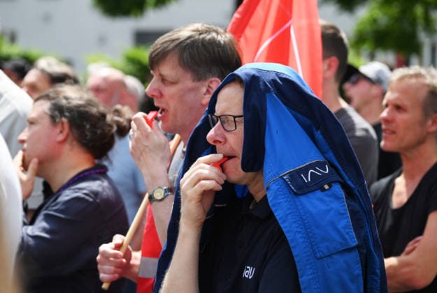 Protest rally by employees of IAV in Berlin BERLIN, GERMANY - JUNE 02: Employees of automotive development services provider IAV take part in a protest rally against job cuts and the closure of parts of the company’s facilities in Berlin, on June 02,2026. Employees at IAV are protesting planned job cuts in Germany expected by mid-2027, including the effective closure of the company’s Berlin site, which would impact around 1,250 employees, according to local media. Vladimir Sindeyev Anadolu Berlin Germany. Editorial use only. Please get in touch for any other usage.  Copyright: x2026xAnadoluxVladimirxSindeyevx